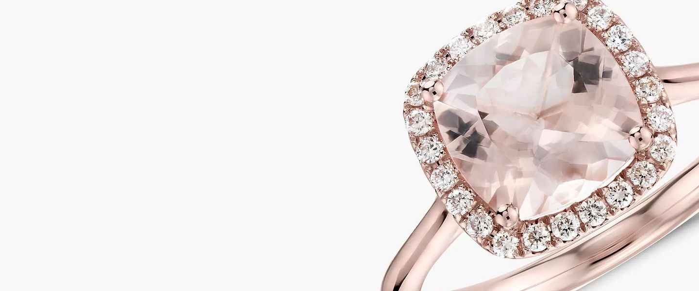A large cushion cut morganite gemstone engagement ring